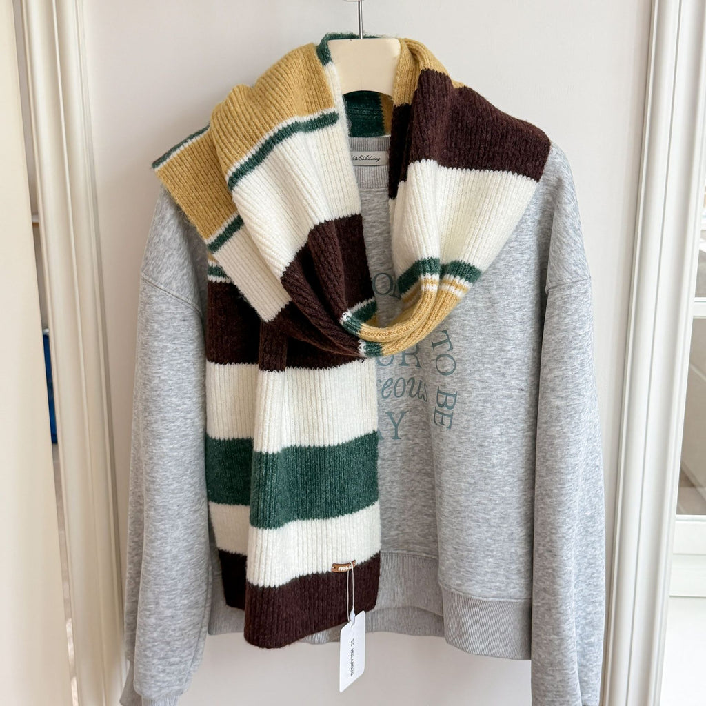 Women’s long striped wool scarf, wide knit stripes in mustard yellow, brown, and green.
