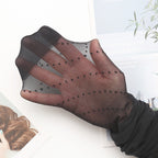Black sheer tights with dotted stripe design, control top section visible