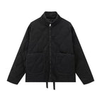 Black quilted stand-collar zip-up jacket with long sleeves and two front flap pockets.