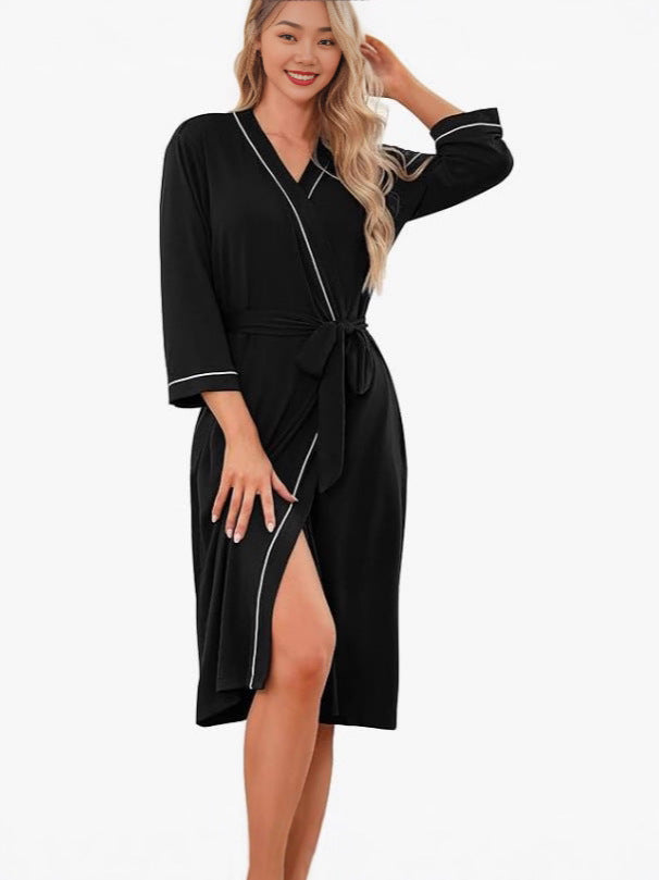 Lightweight wrap kimono robe in black with contrast piping, V-neck and tied waist belt, knee length