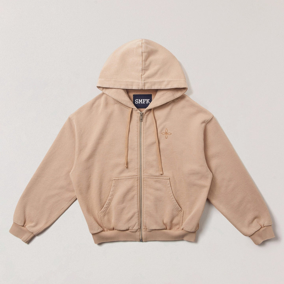Beige zip-up hoodie with hood and kangaroo pocket, embroidered chest detail.
