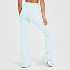 Women’s high-waisted crossover flare leggings in light blue, wide bootcut pant legs