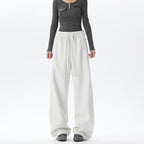 Women's gray barrel-leg lounge pants with elastic waist and drawstring ties