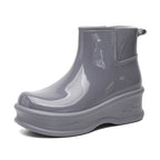 Women's dark gray glossy ankle rain boots, chunky platform pull-on style