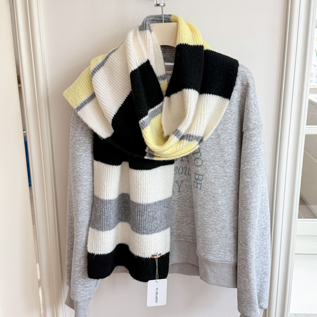 Women’s long striped wool scarf, wide knit stripes in black and white.