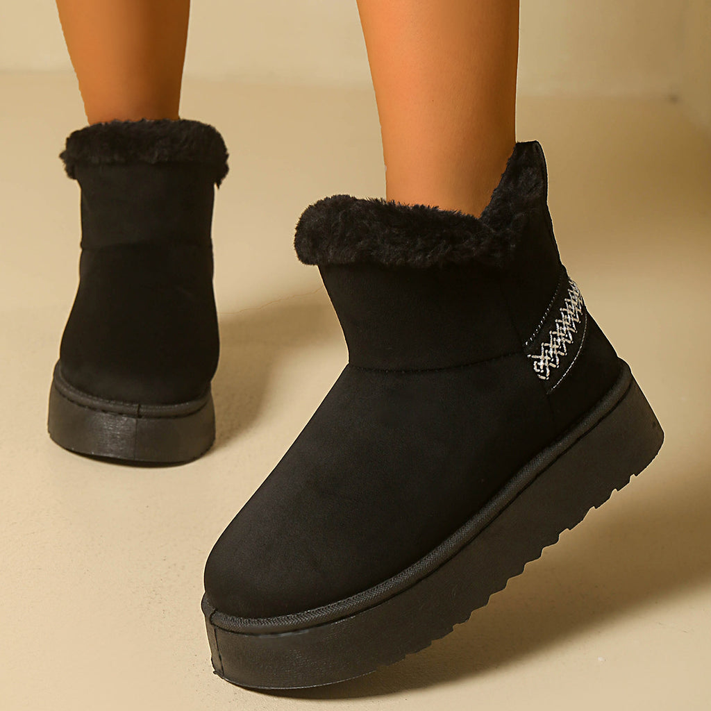 Women’s platform snow boots in black faux suede with faux fur trim, slip-on ankle style