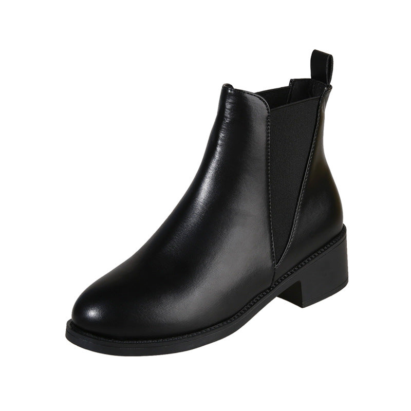 Black chelsea ankle boot with chunky block heel and round toe, pull-on style