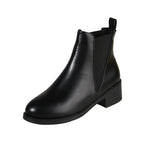 Black chelsea ankle boot with chunky block heel and round toe, pull-on style