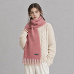 Chunky boucle knit scarf for women, pink with long fringe tassels and logo tag
