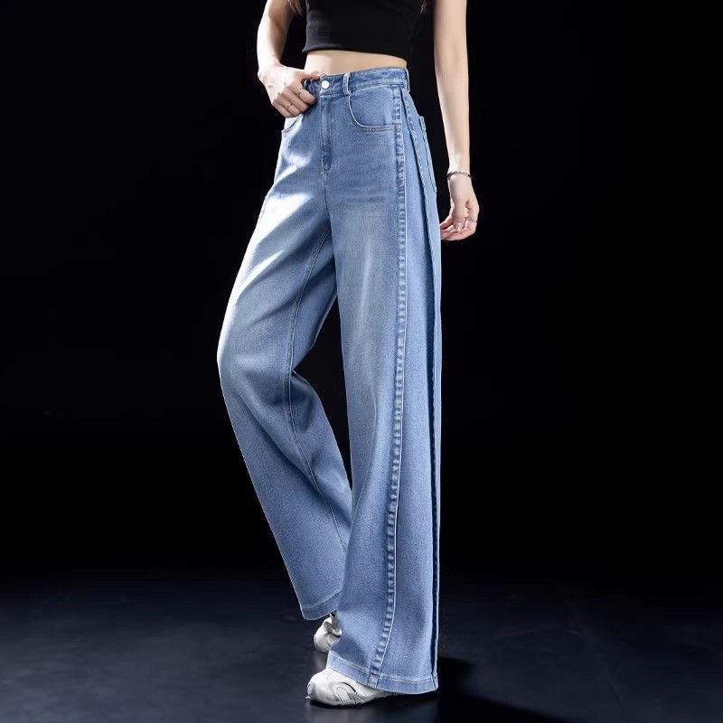 Light blue high-waisted wide-leg denim jeans with button closure and pockets