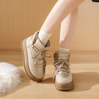 Fleece-lined lace-up puffer snow boots in beige with quilted nylon and platform sole