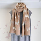 Camel dog-print scarf with a contrasting reverse and fringed ends, wrapped around a mannequin