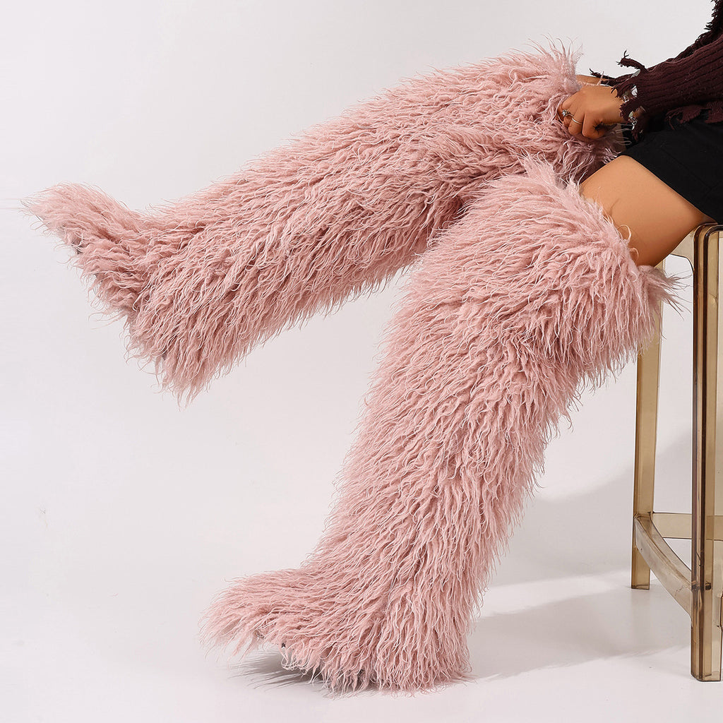 Blush pink shaggy over-the-knee boots with long fur fibers