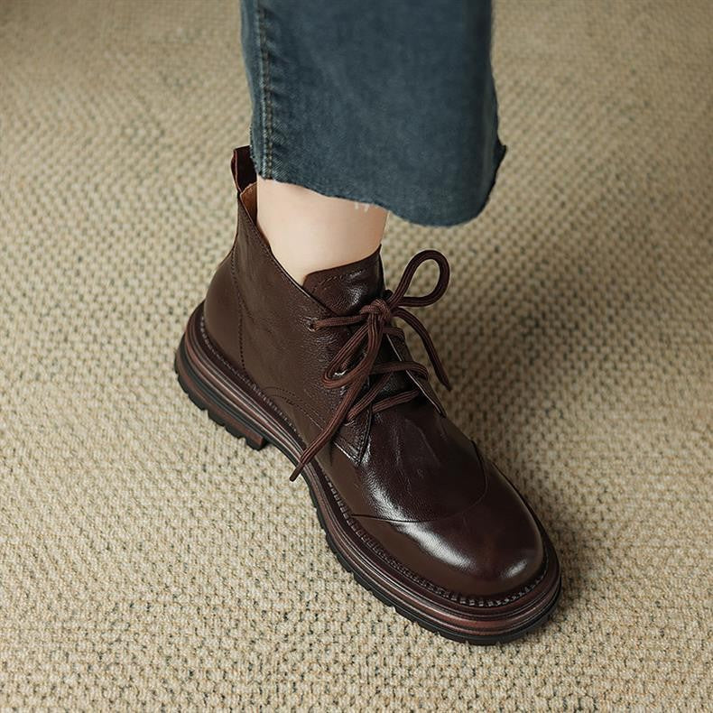Women’s dark brown lace-up ankle boots with pull tab, round toe, chunky lug sole