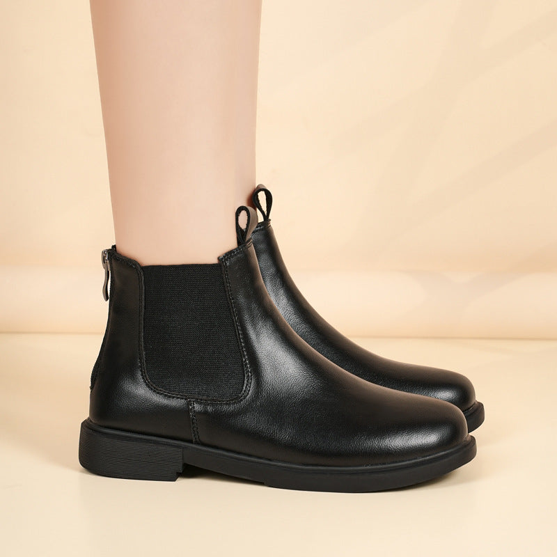 Black chelsea ankle boots with elastic side gore, round toe, low block heel