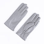 Light gray leather gloves with three-strap cuffs, fleece-lined winter style.