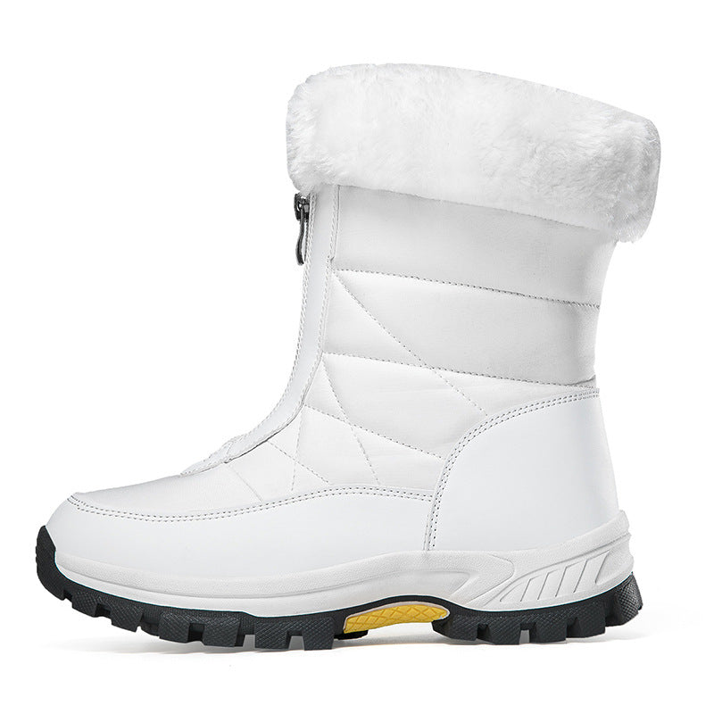 White mid-calf zip-up snow boots with faux fur collar and lug sole.