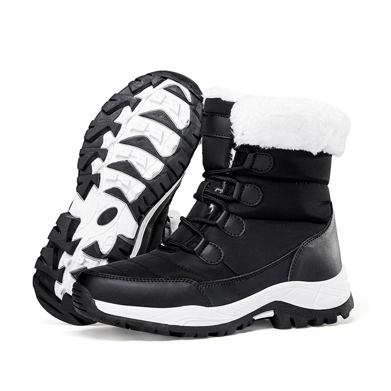 Black faux fur lined lace-up snow boots with rugged tread sole, side view.