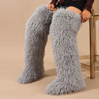 Light gray shaggy faux fur thigh-high boots shown from the front.