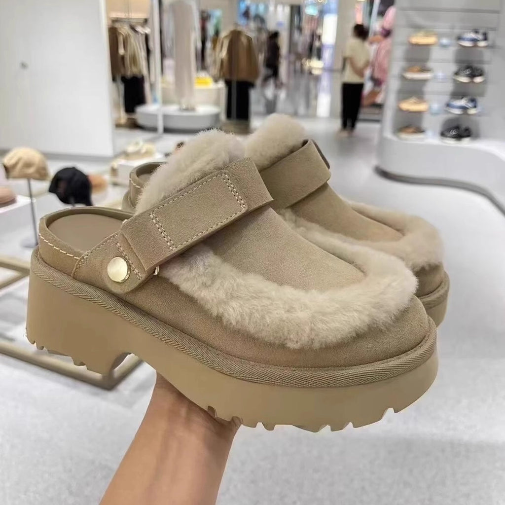 Light beige furry slip-on slippers with Velcro strap and thick platform sole.