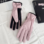 Pink insulated ski gloves with black interior panels and padded fingertips