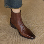 Brown square-toe Chelsea ankle boots with side elastic gore and stacked block heel