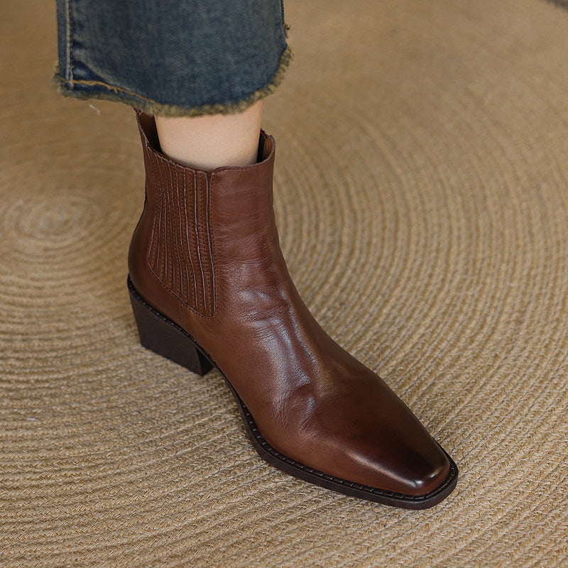 Brown square-toe Chelsea ankle boots with side elastic gore and stacked block heel