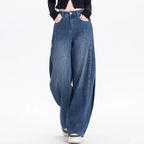 Dark blue high-waisted wide-leg jeans with deep front pockets and belt loops