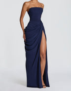 Strapless dark navy maxi dress with ruched bodice, draped wrap front and high slit