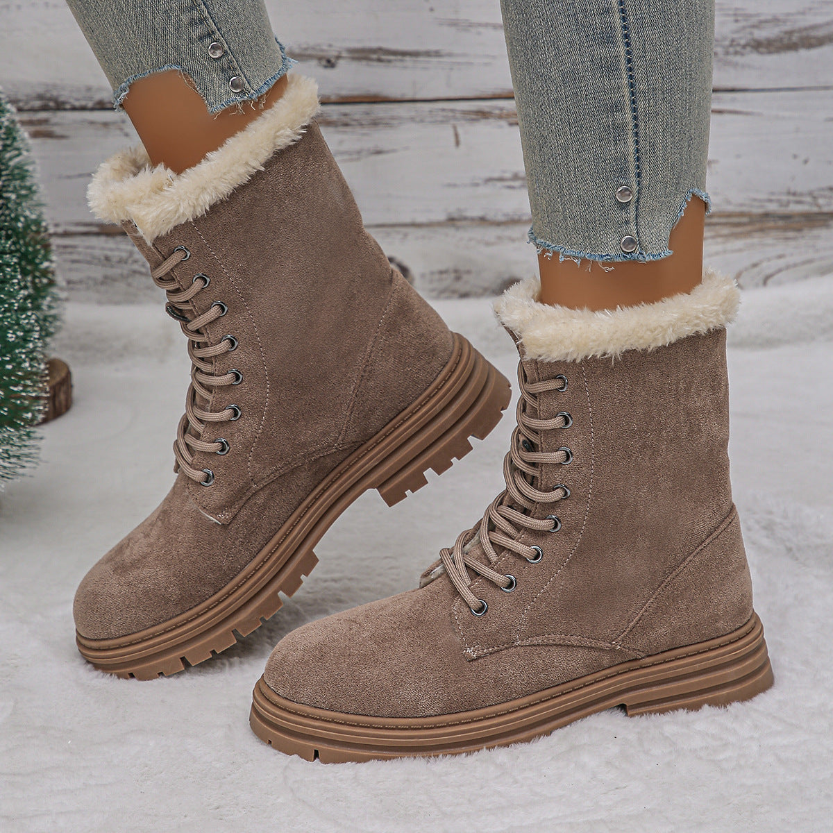 Brown faux suede lace-up combat boots with faux fur cuff and thick lug sole