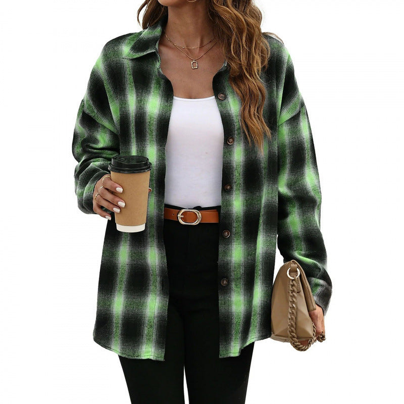 Green and black plaid oversized button-down shirt with long sleeves and front buttons