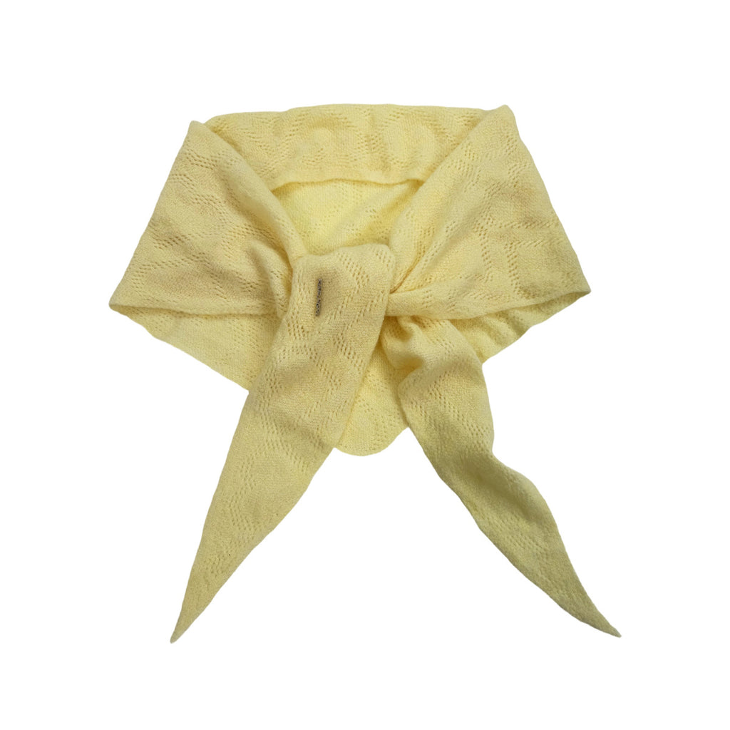 Pale yellow knit triangle scarf with openwork pattern