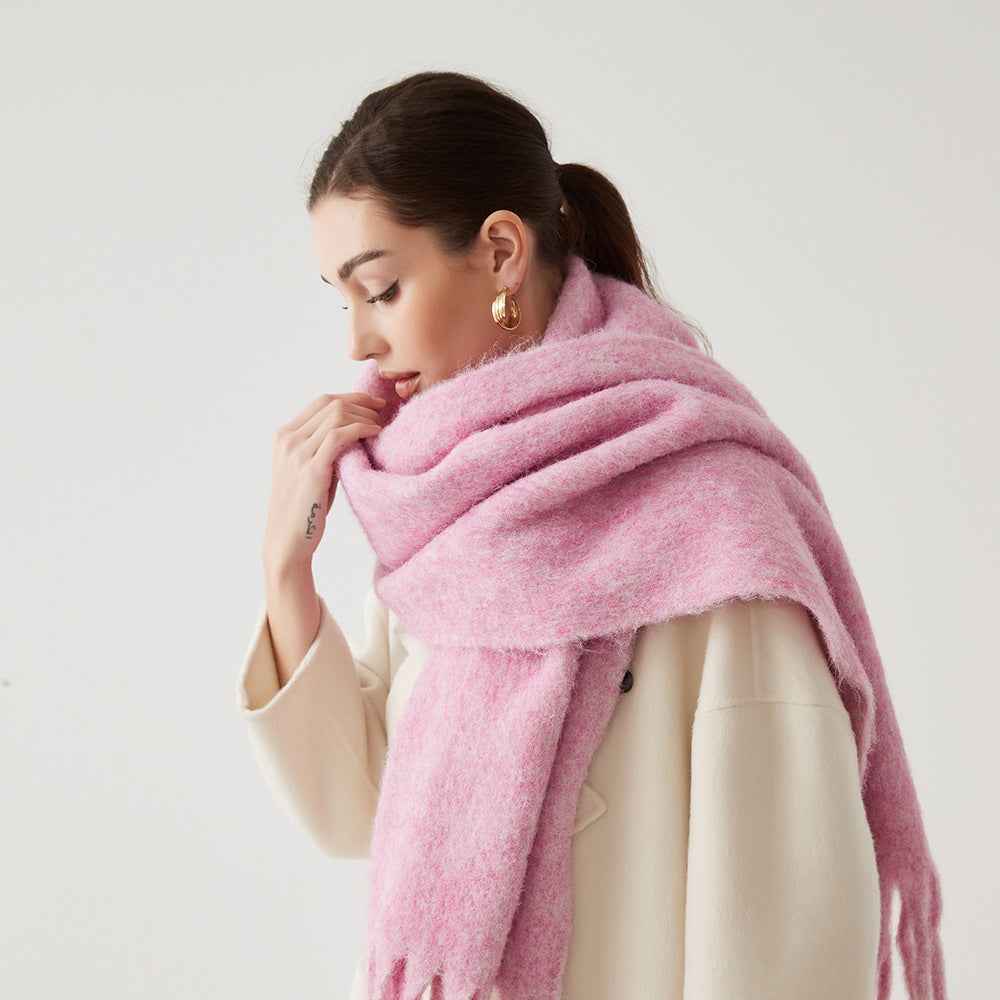 Oversized fuzzy mohair-blend scarf with fringe ends, pink, worn draped over shoulders