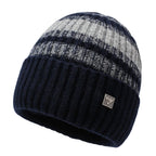 Striped knit beanie in navy blue with gray stripes and metal badge on cuff