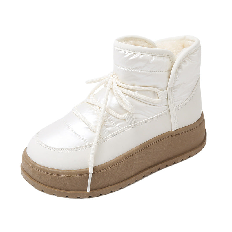 Fleece-lined lace-up winter snow boots in white with quilted upper and tan platform sole