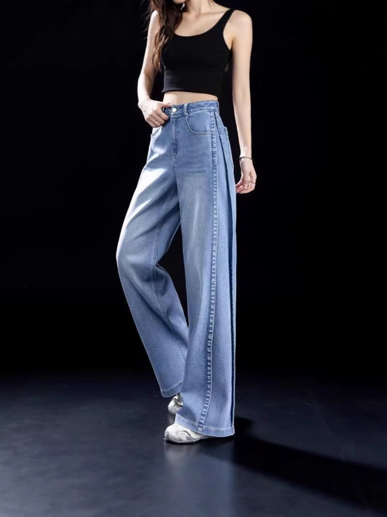 Light blue high-waisted wide-leg denim jeans with straight relaxed legs