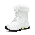 Women’s mid-calf faux fur snow boot in white with quilted upper and lace-up front