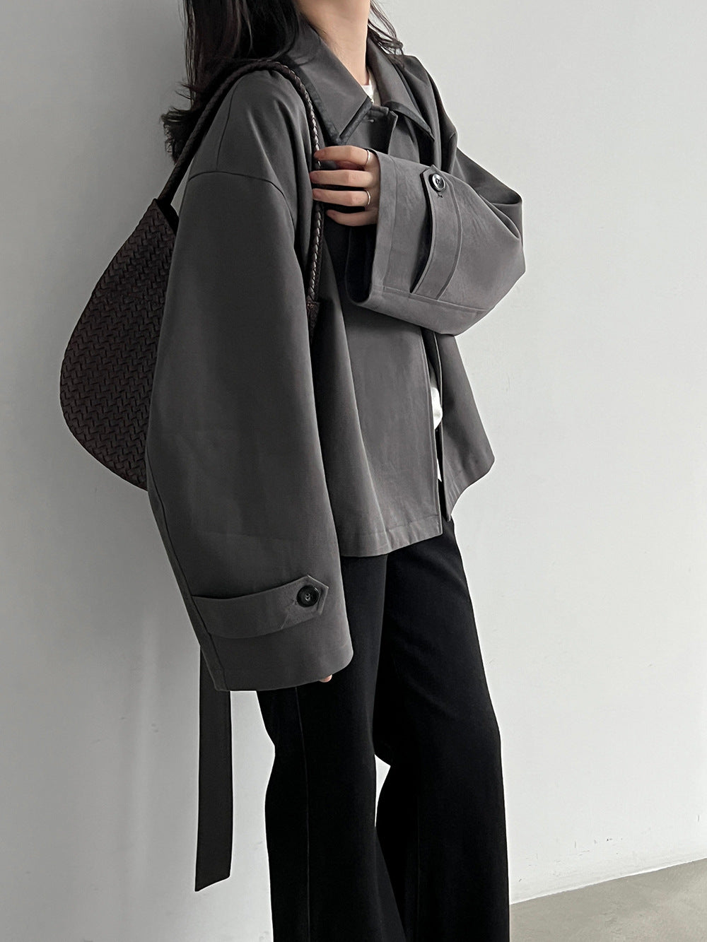 Cropped belted trench jacket in dark gray with contrast collar, button-front, side tie