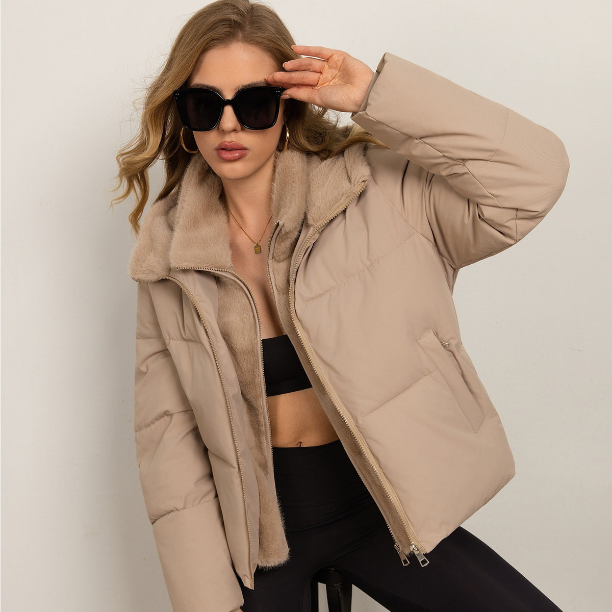 Women’s beige cropped puffer jacket with faux fur collar and front zip