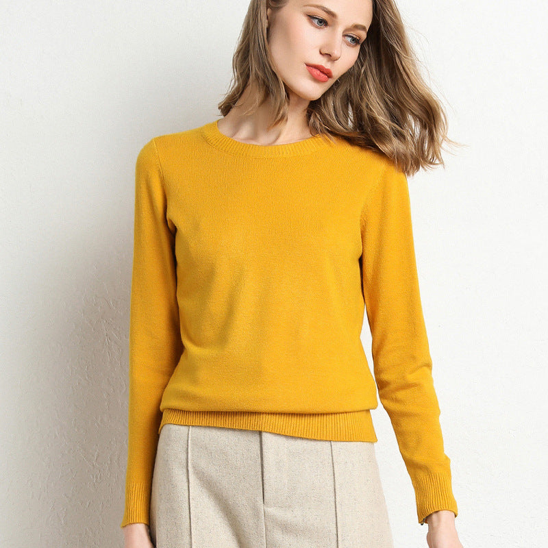 Mustard yellow women's crew neck sweater with ribbed cuffs and hem