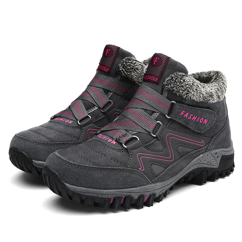 Gray snow boots with faux fur lining, hook-and-loop straps, pink trim lug sole