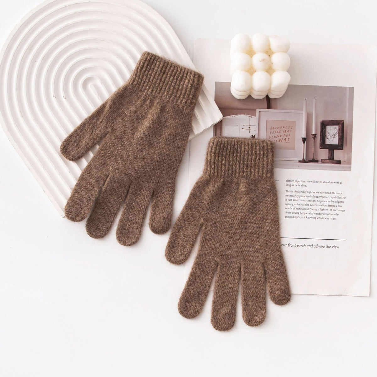 Brown knit winter gloves with ribbed cuffs and five-finger design