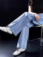 Light blue high-waisted wide-leg jeans with front seam and raw hem cuffs