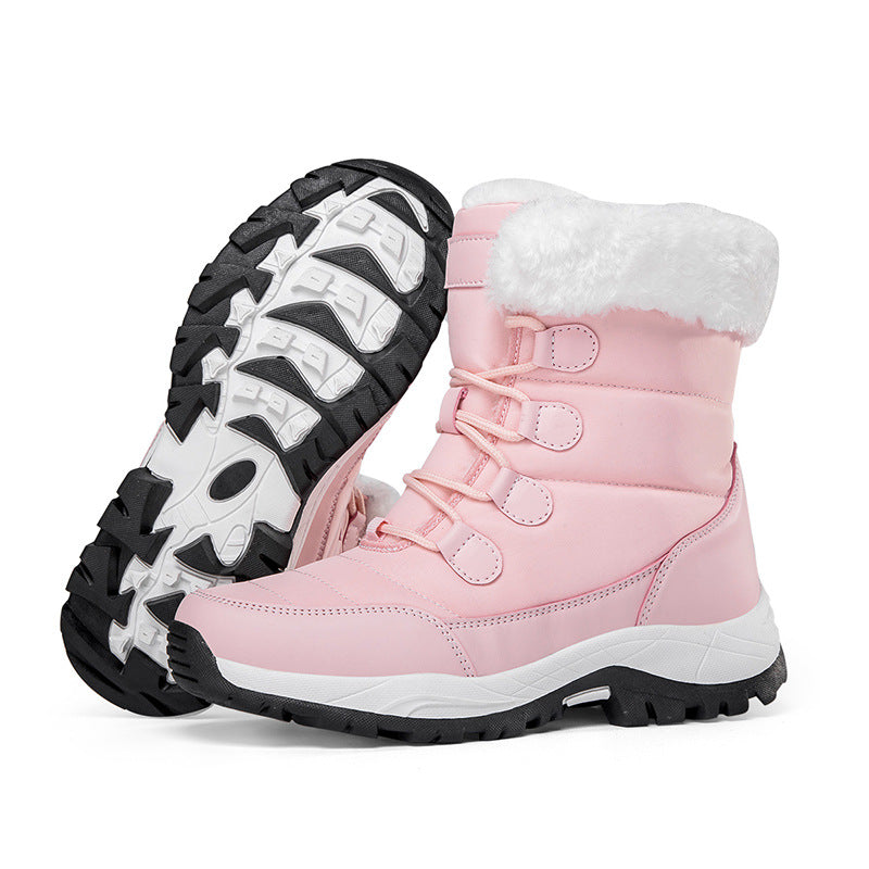 Pink faux fur lined lace-up snow boots with rugged tread sole, side view.