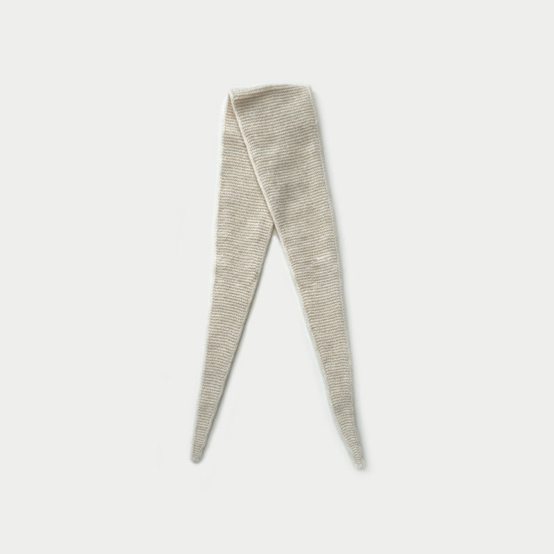 Beige wool knit skinny scarf with pointed ends, shown folded for a close-up.