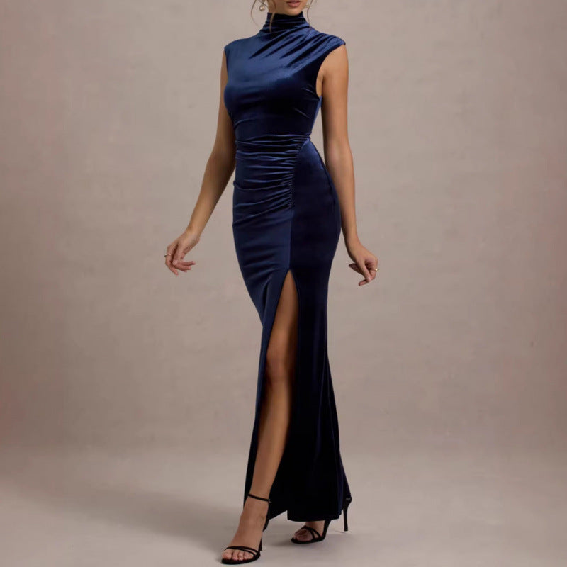Navy velvet maxi dress with mock neck, sleeveless ruched bodycon silhouette, high slit
