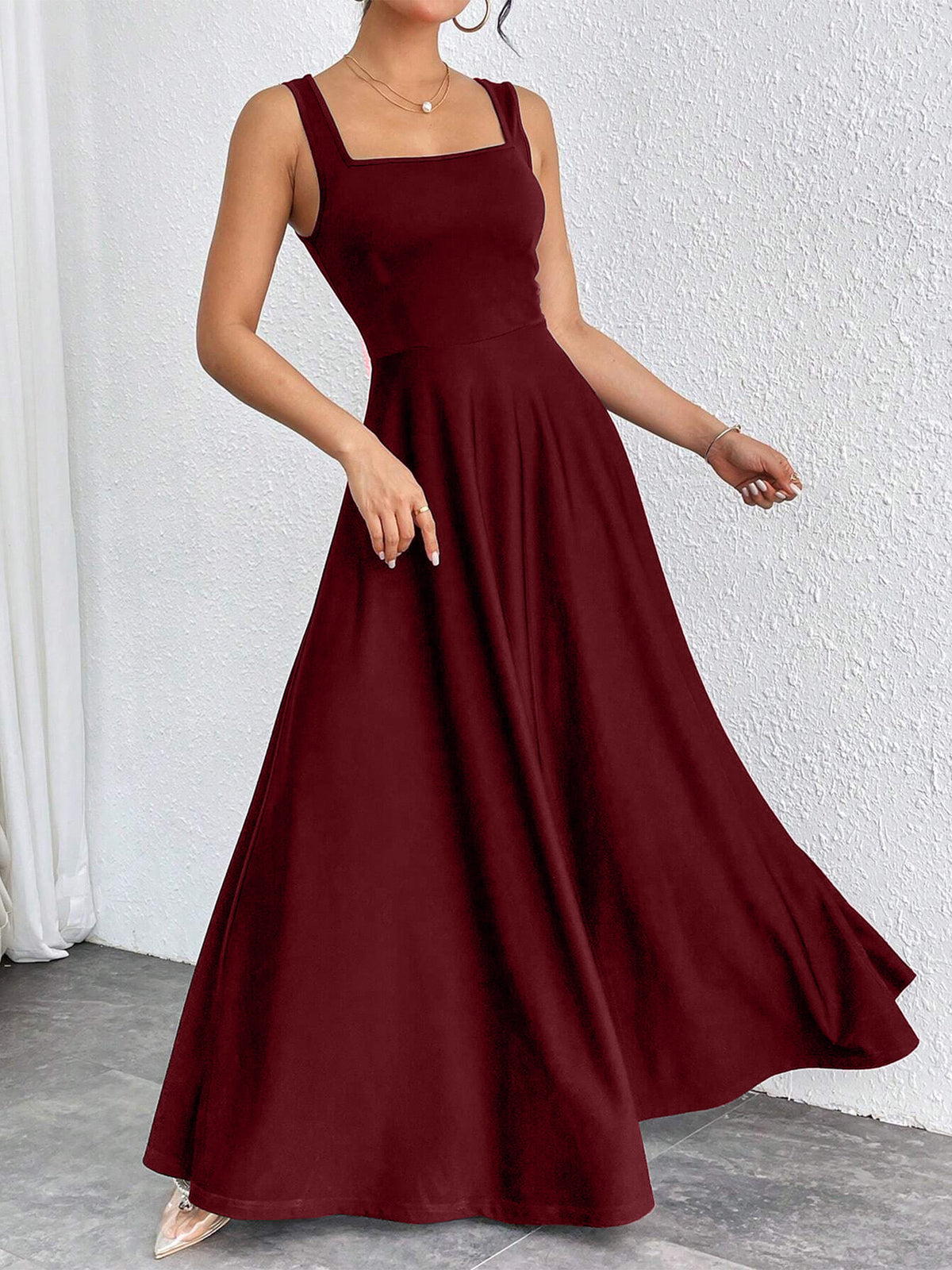 Burgundy sleeveless square-neck long dress with fitted bodice and flared skirt