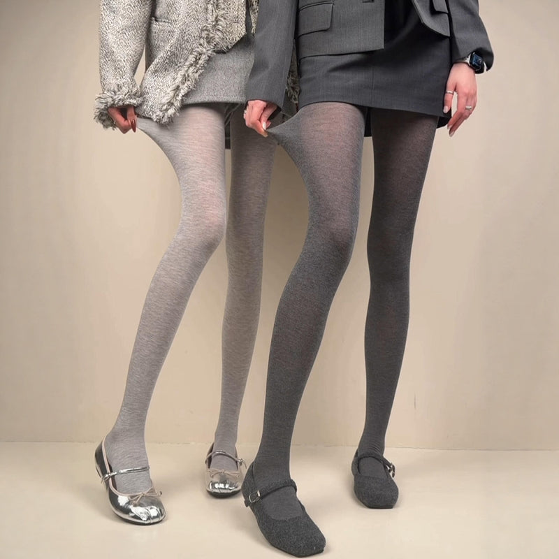 Heathered tights in light gray and dark gray shown with footed stretch fit