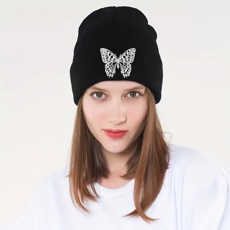 Black knitted beanie hat with butterfly embroidery detail