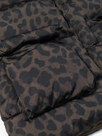 Leopard print puffer jacket close-up showing quilted panels and gathered fabric